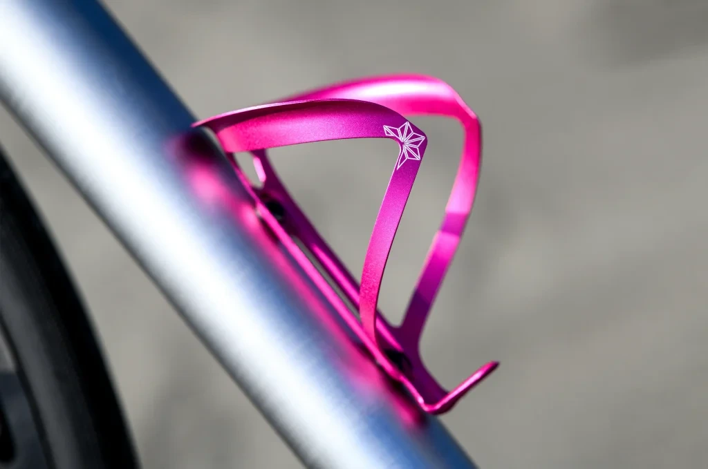 Supacaz Fly Cage Ano Bottle Cage PINK.webp