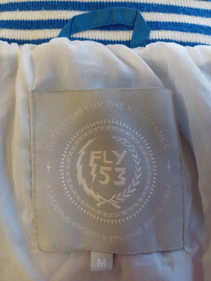 Blue and white Fly53 windbreaker jacket from the 1990s 4.webp